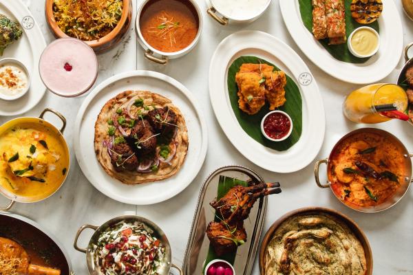 Bowls and plates of delicious food at Bombay Chow Brasserie