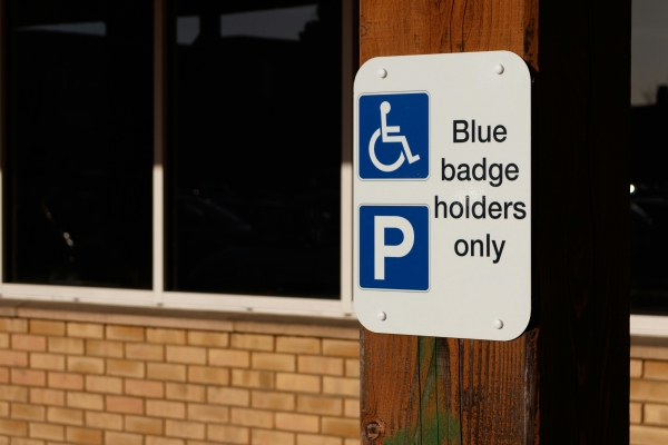 Photo of Blue Badge outdoor sign with the words 'Blue badge holders only'.