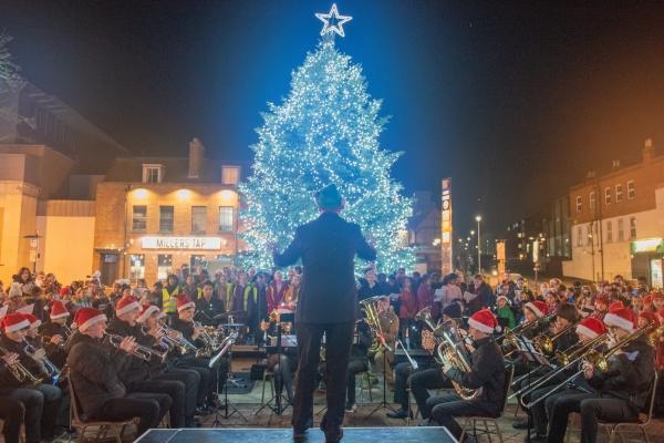 Brass band playing Christmas tunes on the civic centre forecourt