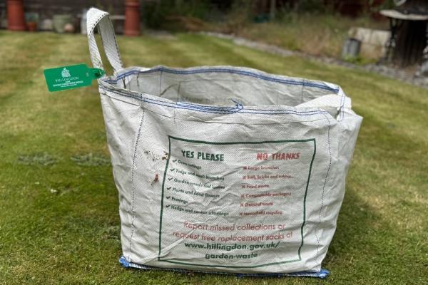 Garden waste bag with tag