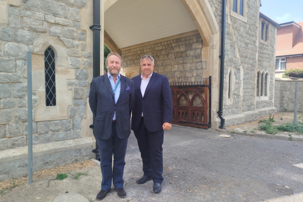 Cllr Jonathan Bianco and Cllr Steve Tuckwell outside the newly-refurbished Hillingdon and Uxbridge Cemetery Gatehouse
