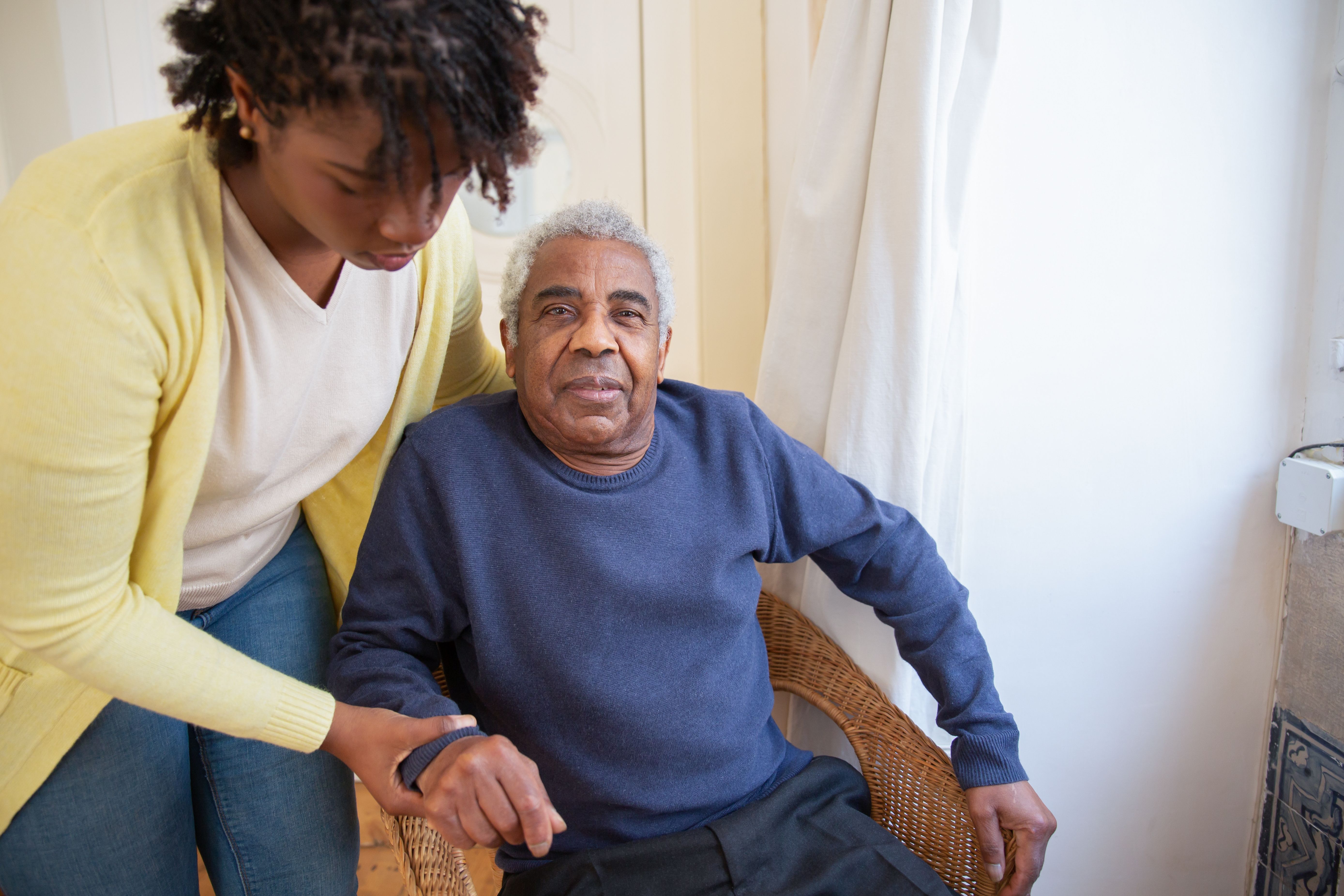 Image of an older person being cared for
