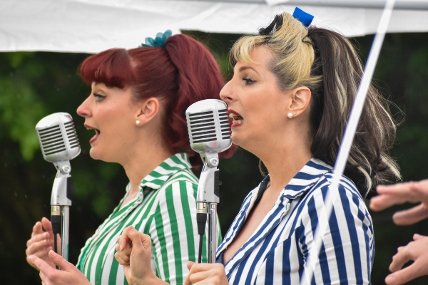 Members of the Candy Girls sing at the 2025 Mayor's Picnic in the Park