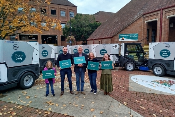 Cllr Eddie Lavery with four winners of the competition to name the council's seven new street sweepers