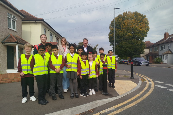 Cllr Steve Tuckwell with Rebecca Beaumont, headteacher of Hayes Park Primary and students.