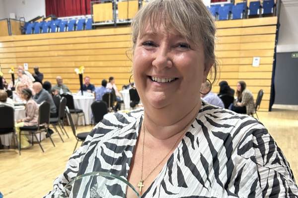 Photo of Sara Turner with her Fostering Award