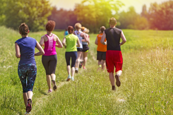 People jogging in a field
