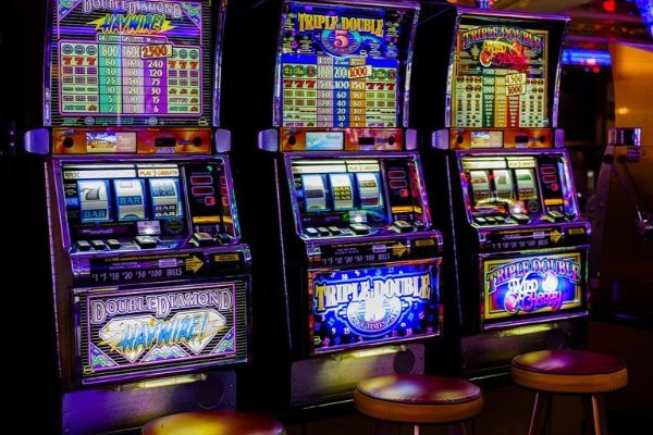 Photo of 3 fruit machine in an adult gaming centre