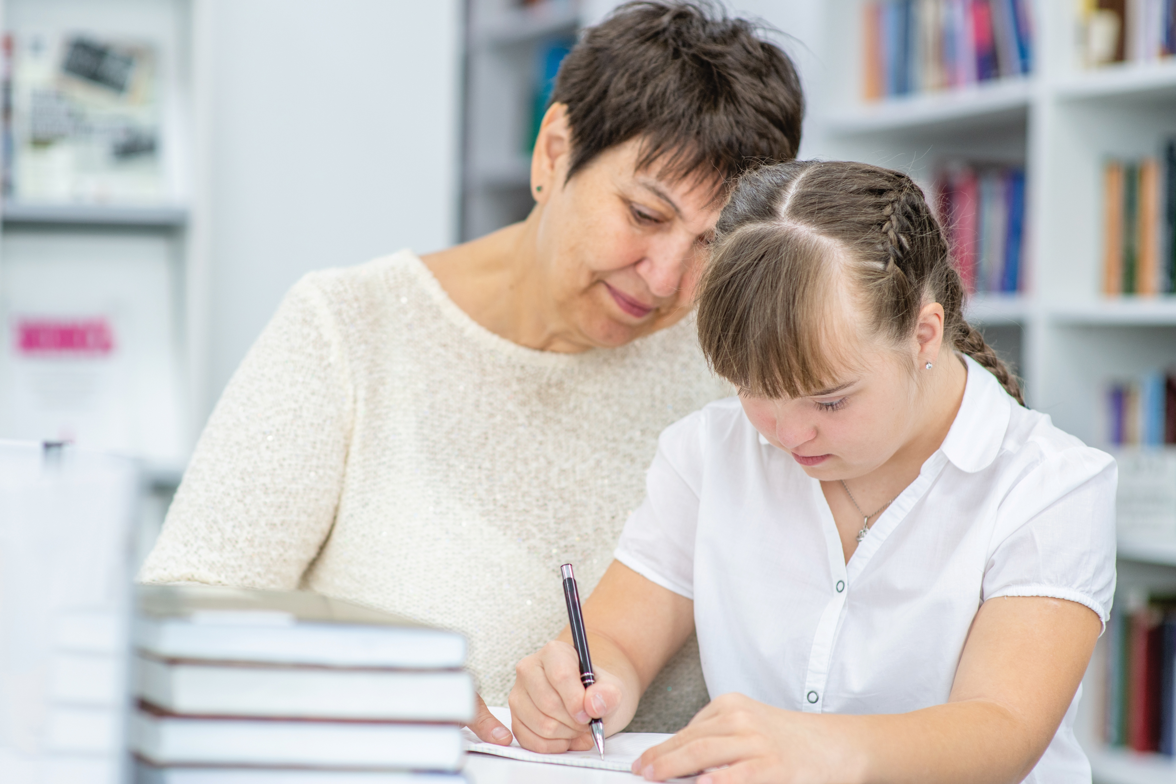 Image of a child and teacher
