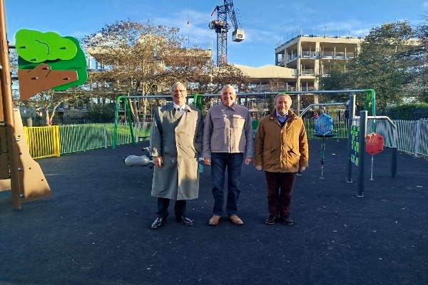 Photo of Cllr Ian Edwards, Cllr Eddie Lavery and Cllr Jonathan Bianco standing in a playground.